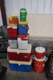 Stack of water coolers and jugs