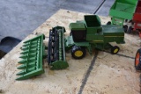 John Deere Combine with corn head and platform