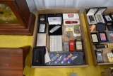 Flat of zippo lighters and cigarette cases