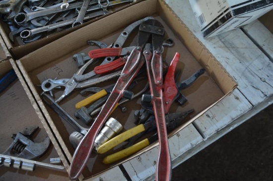 Flat of wire strippers and a set of bolt cutters