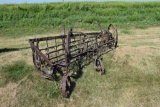 Old John Deere 10' rake with steel wheels