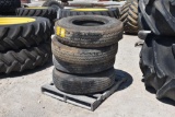 (4) 11.00R20 tires