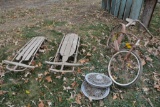 Vintage bicycle, 2 runner sleds, and hubcaps