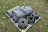 Pallet of conveyor belts and a tarp
