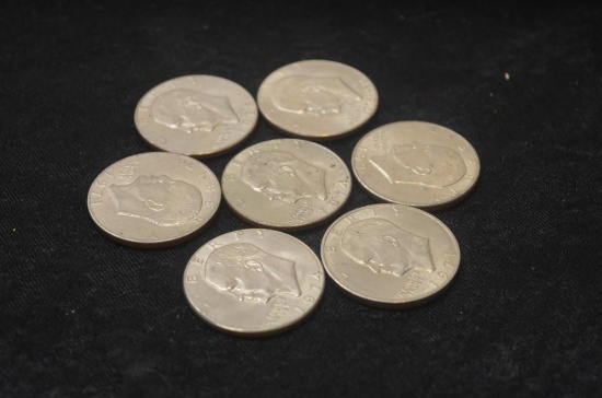 (7) IKE DOLLARS