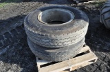 (2) 10.00R20 tires & rims