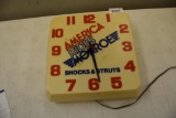 Monroe Shocks and Struts plastic light up clock