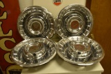 (4) 1957 Cadillac Hubcaps