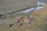 Walk behind potato plow
