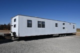 1990 Sundowner 10'x60' bunk house