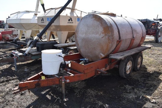 1,000 gal. tank on tandem axle trailer