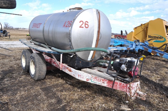 1,000 gal. SS. tank on tandem axle trailer
