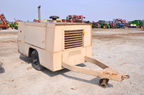 Portable air compressor on 2 wheel trailer