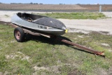 1950 Feathercraft 10 ft. racer boat with single axle trailer