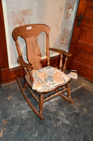 Antique rocker with padded seat