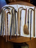Large quantity of umbrellas & canes