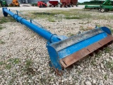Tractor mounted auger for grain flat storage