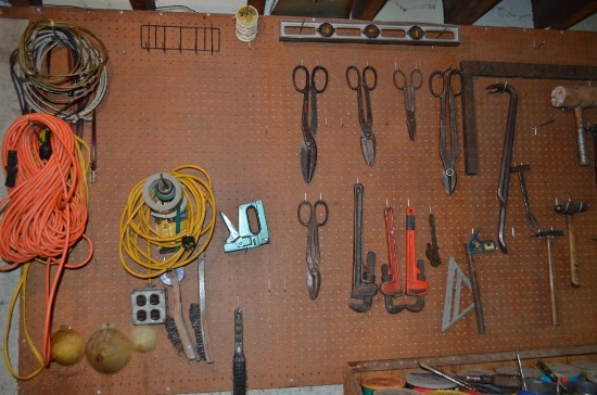Contents on (2) large peg boards, tools to include: hammers, crow bars, tin snips, ext. cords, hand