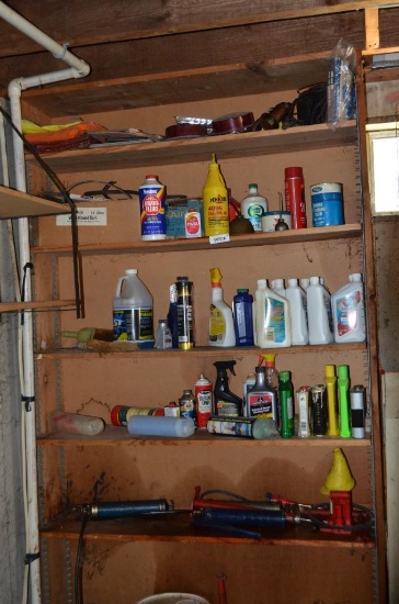 Contents of open front shelves: grease guns, motor oil, buckets & smaller bottle jack, Shelf does