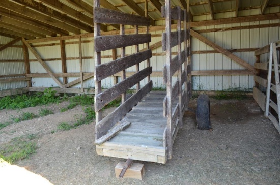 Wooden shop built loading chute, wooden hay feeders, cinder blocks, few other misc. items in open