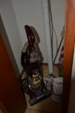 Contents of closet, vacuum, flag, etc.