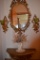 Mirror, shelf, and wall sconces