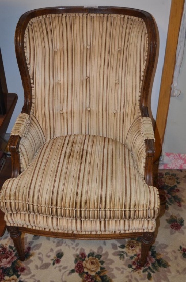 Upholstered fireside arm chair