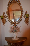 Mirror, shelf, and wall sconces