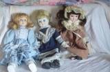 (3) Porc. dolls as pictured