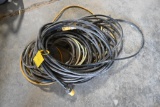 Assortment of jumper cables & extension cords