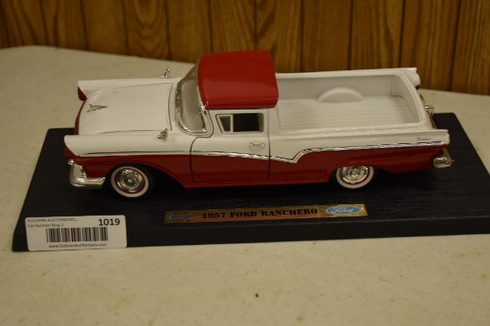 1957 Ford Ranchero Diecast car in plastic stand