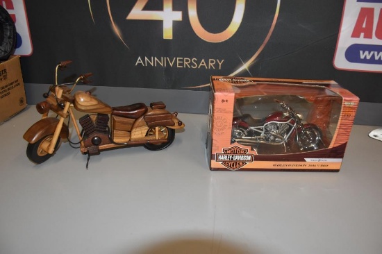 (2) Motorcycle advertising items to include 2004 V-Rod Harley Davidson die cast