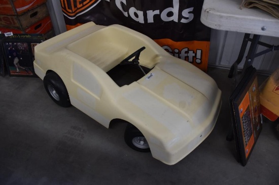 Battery powered child's plastic go cart
