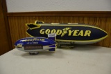 (2) Good Year Blimps, 1 is a battery operated plastic motion advertising piece, other is a blow up