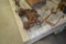 Primitive cast iron items including: pulleys & grabbers