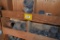 Schedule 80 plastic pipe fittings in wooden cabinet