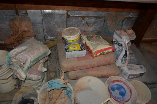 Bags of concrete mix & buckets