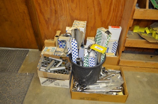 Several boxes of chrome/ brass drain parts