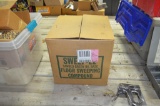 Nearly full box of sweeping compound