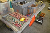 Several containers for oil furnaces including nozzles, filters, etc.