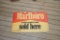 Plastic Vintage Marlboro sign has some cracks