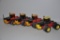 (4) Verstaile toy tractors - approx. 1/32 scale