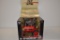 ERTL 1/16 scale Farmall 560 Hi-Clear with Case IH and Ertl 60th Anniversary Hat