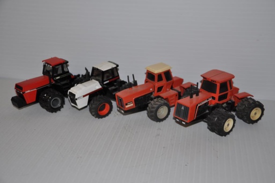 (4) Case & AC toy 4WD tractors - approx. 1/32 scale