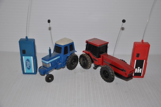 (2) remote controlled toy tractors