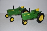 (2) John Deere 1/16 scale toy tractors - one narrow front; one wide front