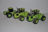 (3) Steiger toy tractors - approx. 1/32 scale