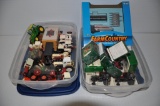 (2) containers of 1/64 farm toys