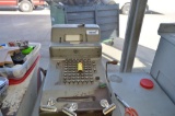 Older cash register & metal cabinet below