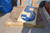 Quantity of metal numbers that would be found at a road side gas station